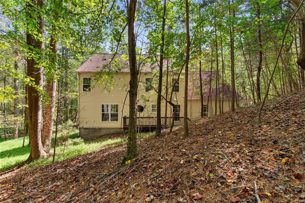 80 Castle Court Ellijay, GA 30540 - Photo 32 of 37 a backyard of a house with lots of green space