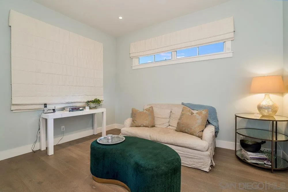 5769 Waverly Avenue La Jolla, CA 92037 - Photo 13 of 30 a living room with furniture and a couch