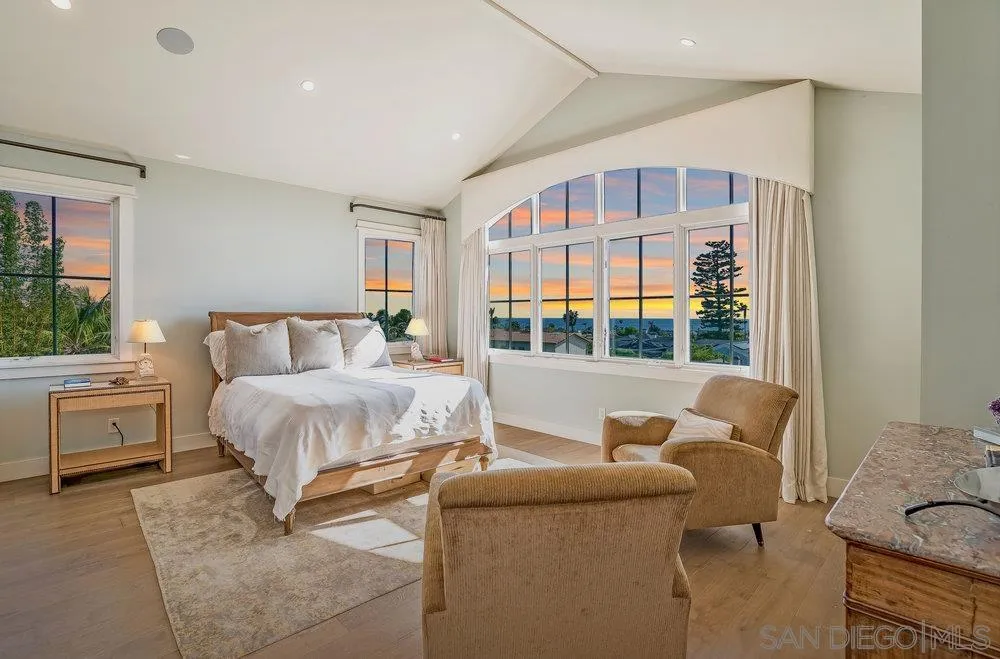 5769 Waverly Avenue La Jolla, CA 92037 - Photo 15 of 30 a bedroom with a bed and a window