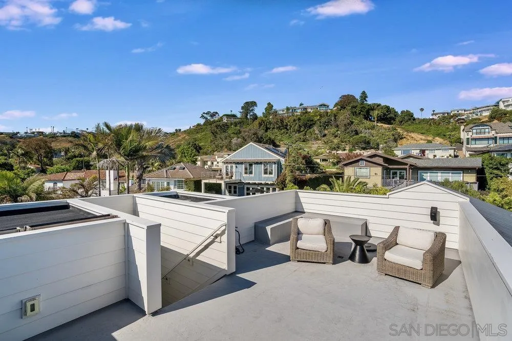 5769 Waverly Avenue La Jolla, CA 92037 - Photo 28 of 30 a view of a terrace with a bench