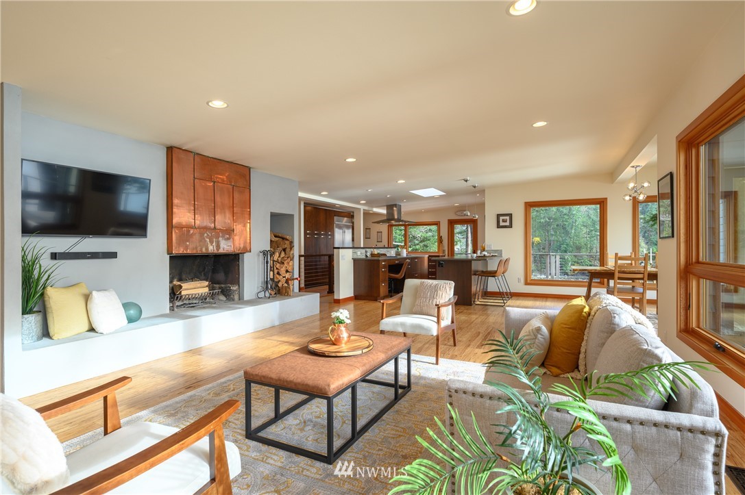 340 Cove Road Bellingham, WA 98229 - Photo 13 of 40 a living room with fireplace furniture and a flat screen tv