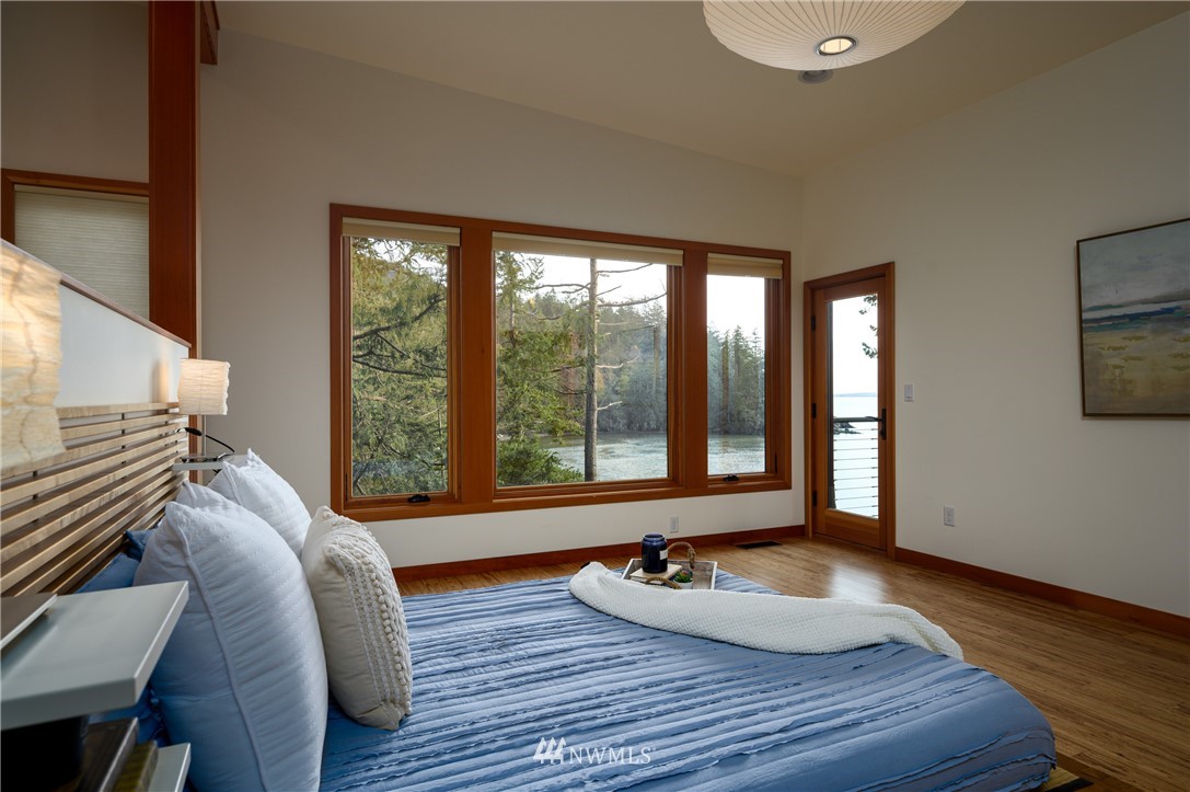 340 Cove Road Bellingham, WA 98229 - Photo 17 of 40 a room with wooden floor and furniture
