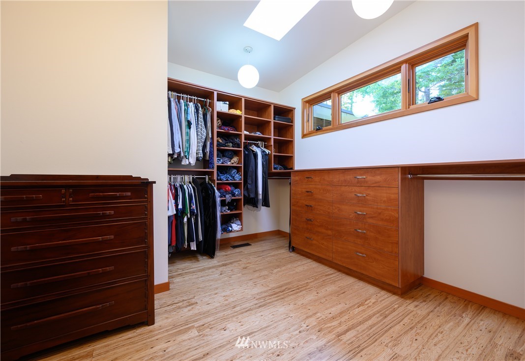 340 Cove Road Bellingham, WA 98229 - Photo 21 of 40 a view of walk in closet with clothes and shoes