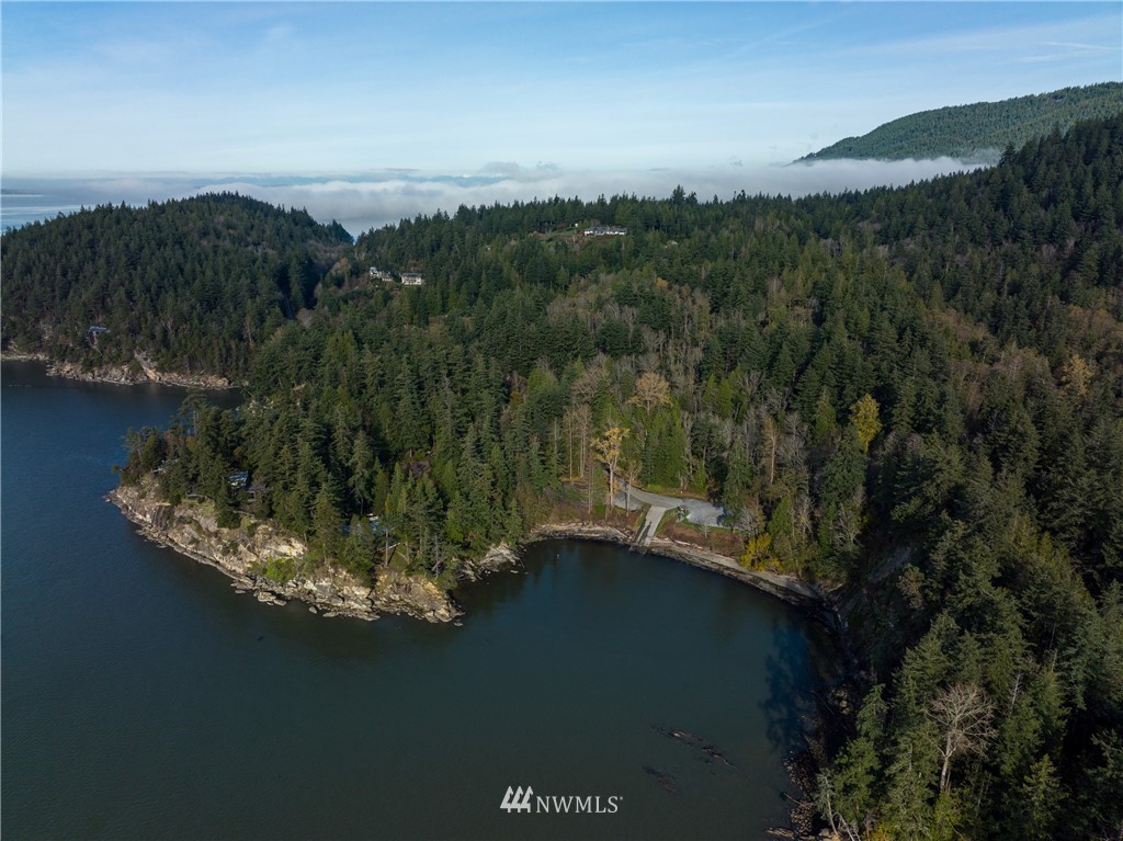 340 Cove Road Bellingham, WA 98229 - Photo 36 of 40 a view of a lake in middle of forest