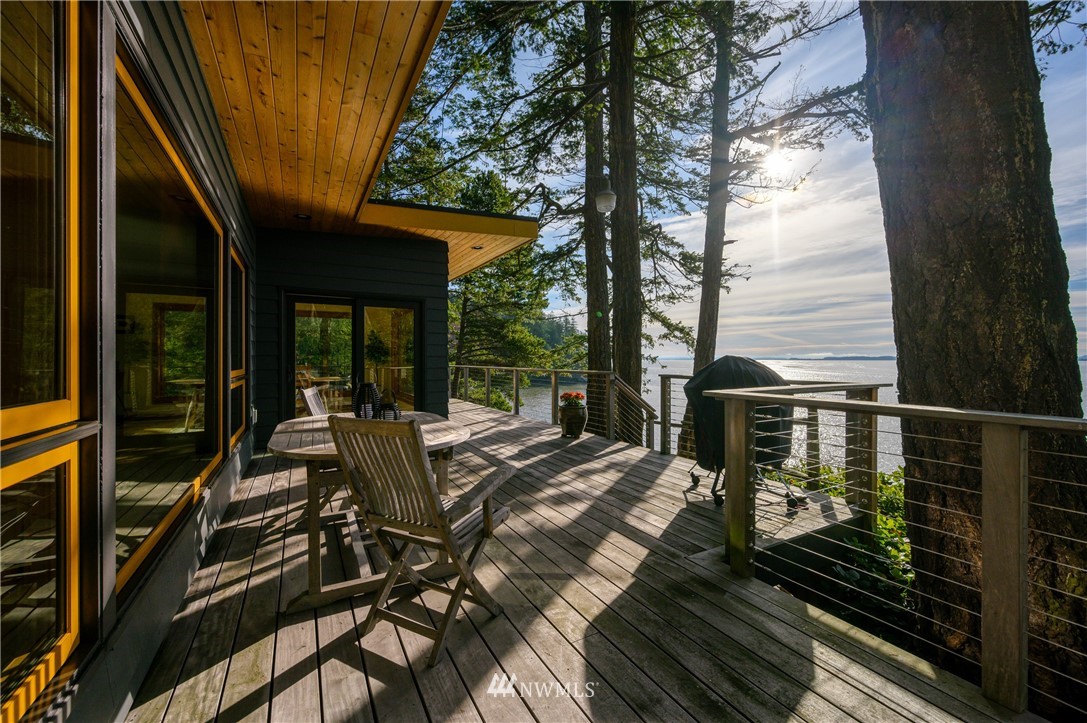 340 Cove Road Bellingham, WA 98229 - Photo 8 of 40 a view of balcony with wooden floor and outdoor seating