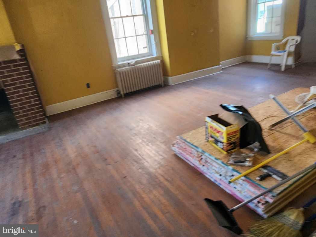 91 West Broadway Salem, NJ 08079 - Photo 15 of 20 a view of workspace with wooden floor