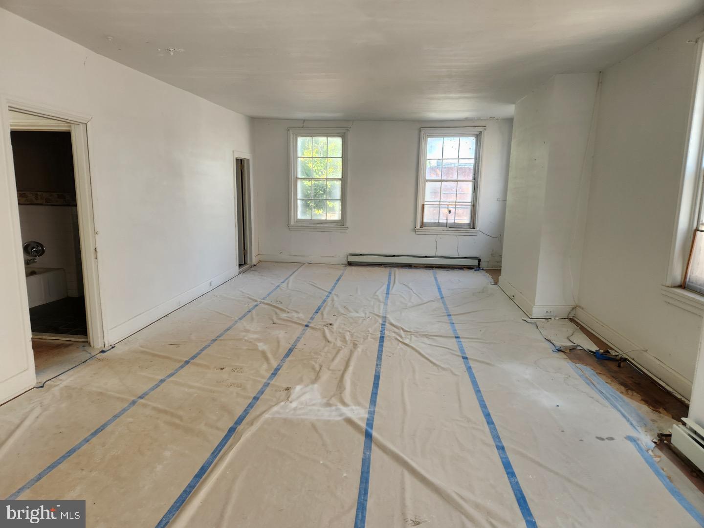 91 West Broadway Salem, NJ 08079 - Photo 3 of 20 a view of an empty room and window