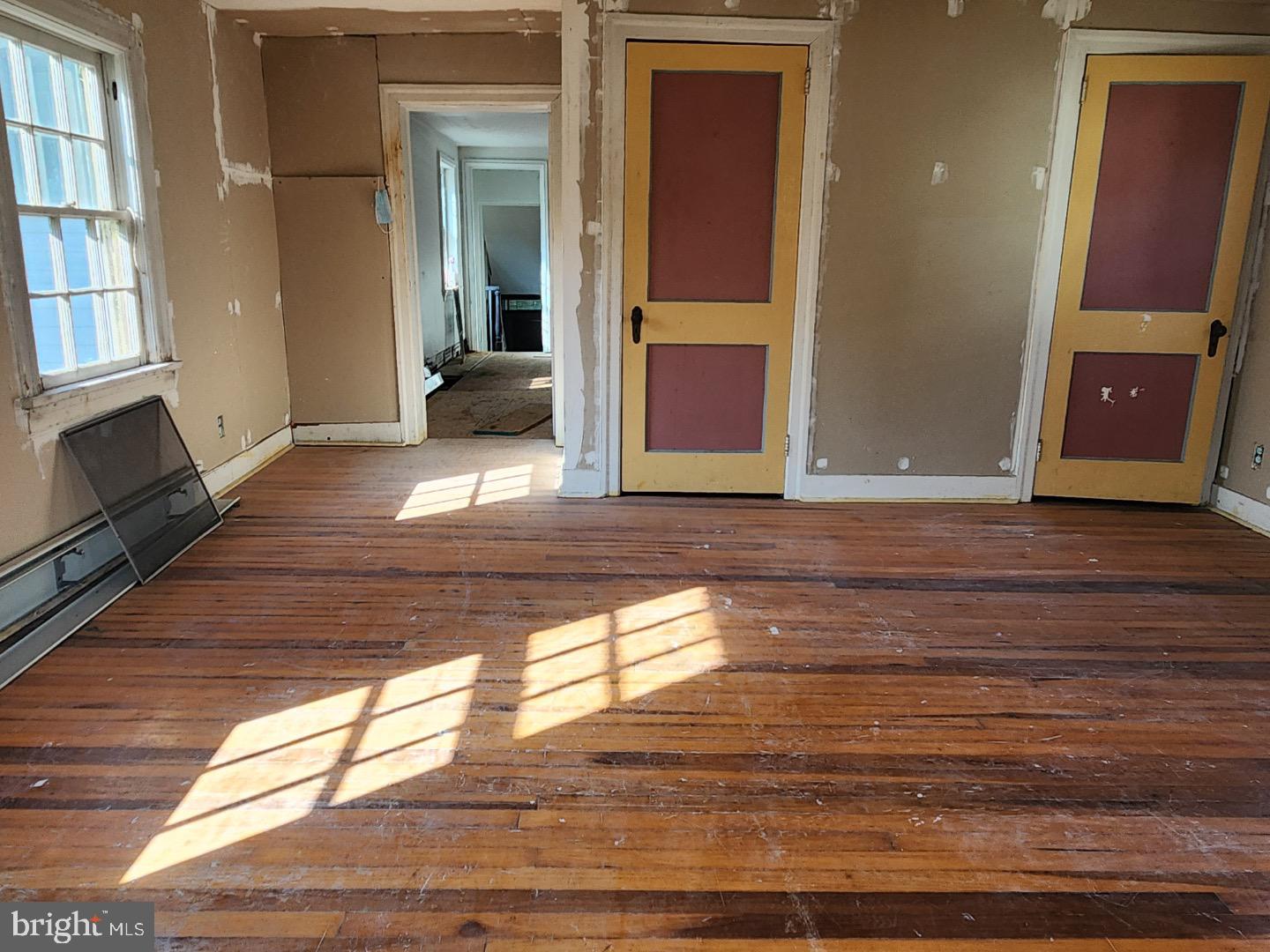 91 West Broadway Salem, NJ 08079 - Photo 9 of 20 a view of living room with furniture and wooden floor