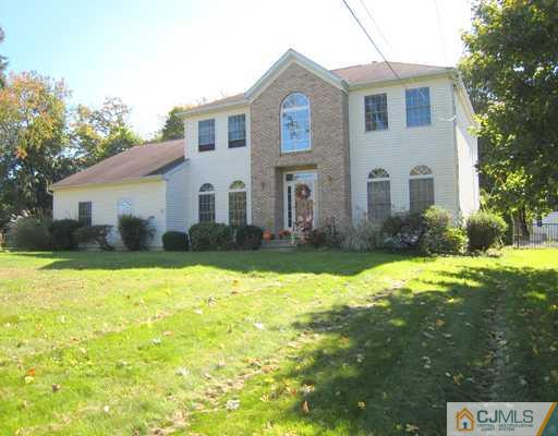 5 Old Ridge Road Monmouth Junction, NJ 08852 - Photo 1 of 24 a front view of a house with a yard