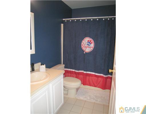 5 Old Ridge Road Monmouth Junction, NJ 08852 - Photo 17 of 24 a bathroom with a toilet and a sink