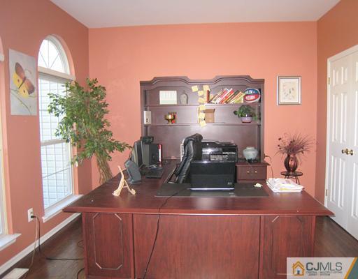 5 Old Ridge Road Monmouth Junction, NJ 08852 - Photo 20 of 24 a view of a room with a large window and potted plants