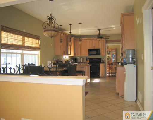 5 Old Ridge Road Monmouth Junction, NJ 08852 - Photo 8 of 24 a lobby with furniture and a chandelier