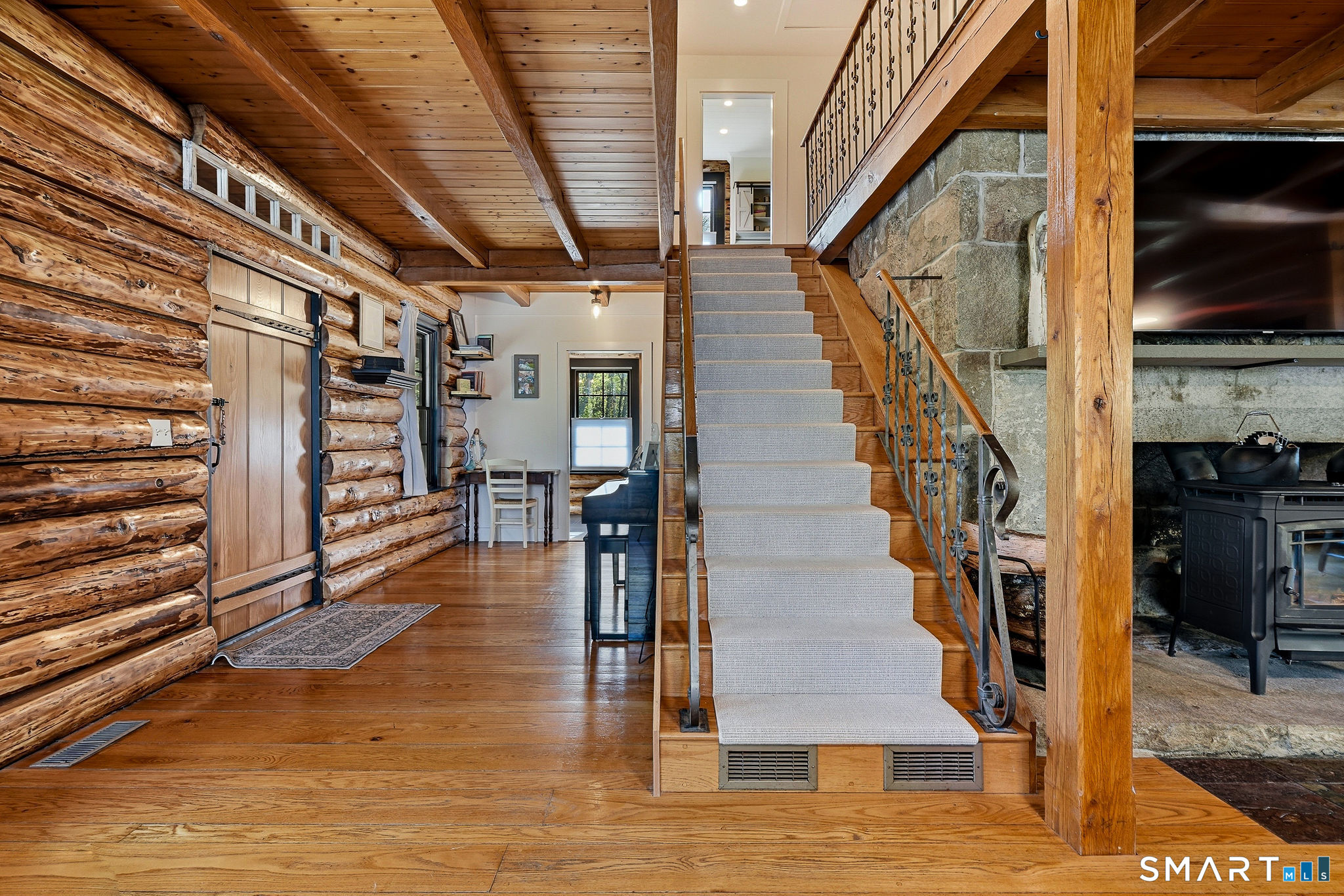 61 Mystic Road North Stonington, CT 06359 - Photo 11 of 40 a view of entryway and hall with wooden floor