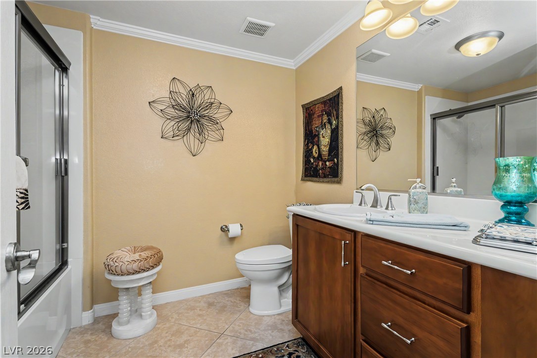 2555 Hampton Road, Unit 3308 Henderson, NV 89052 - Photo 27 of 65 A well-appointed bathroom features a single vanity, a standard toilet, and a combined tub and shower unit.