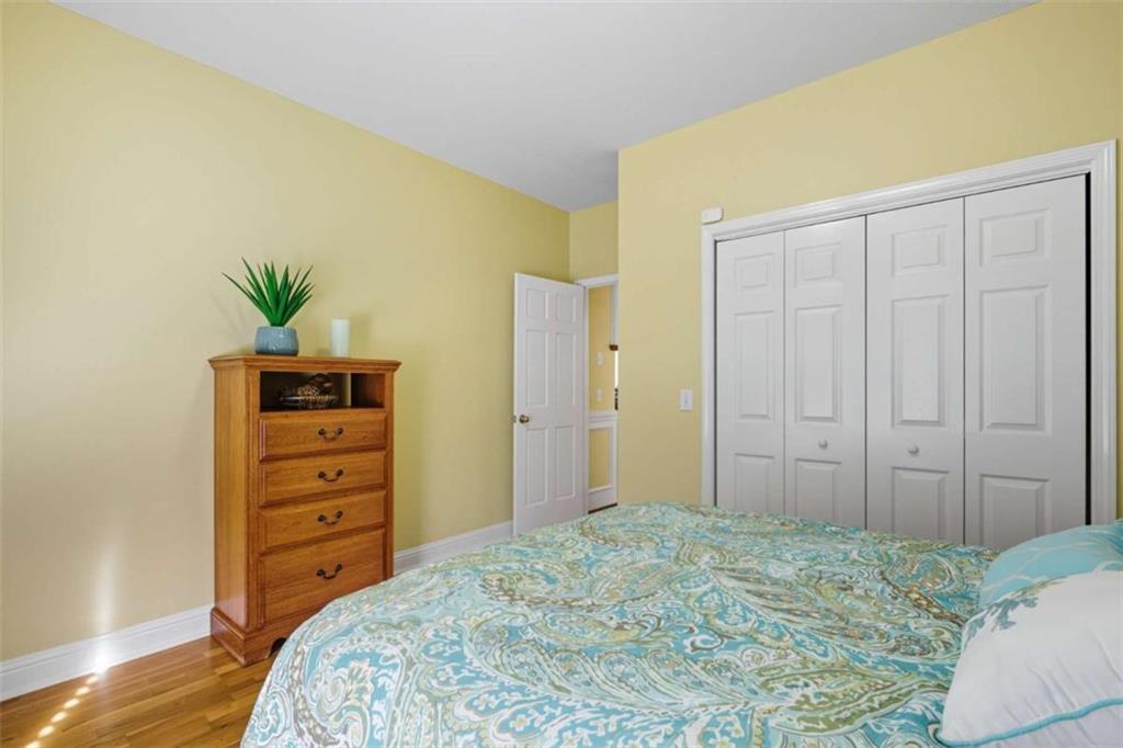 1091 Echota Road Clarkesville, GA 30523 - Photo 30 of 89 a bedroom with a bed and furniture