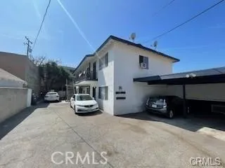 a car parked in front of a house