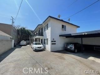 a car parked in front of a house
