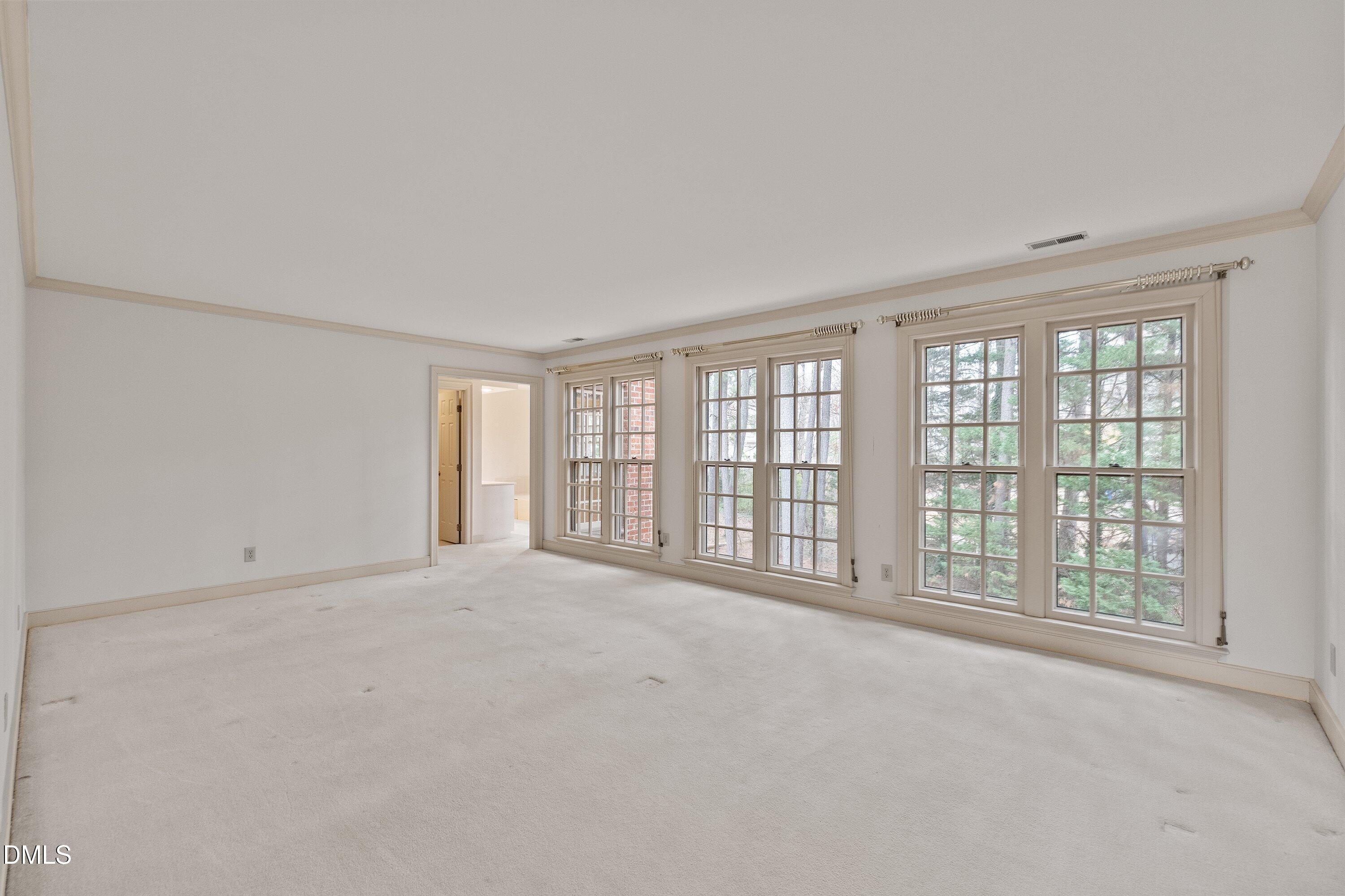 1708 Sawgrass Court Raleigh, NC 27615 - Photo 33 of 60 Primary Bedroom