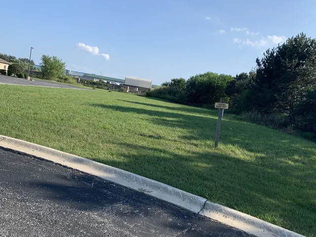 a view of a golf course with a garden