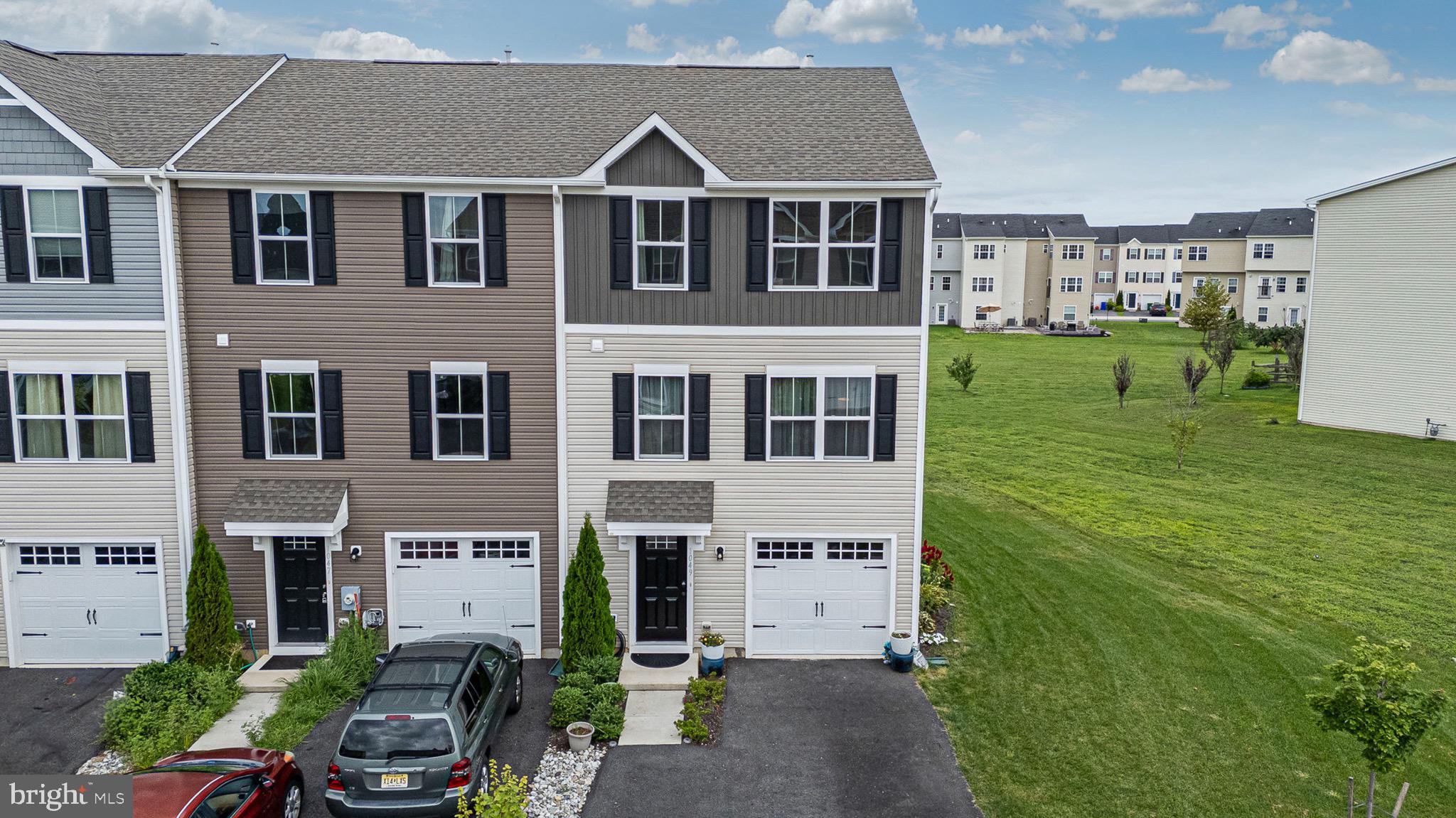1049 Wickersham Way Middletown, DE 19709 - Photo 1 of 33 a aerial view of a house with a yard
