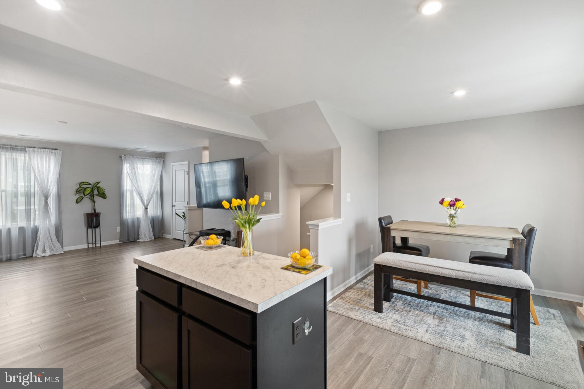 1049 Wickersham Way Middletown, DE 19709 - Photo 16 of 33 a living room with furniture and a table