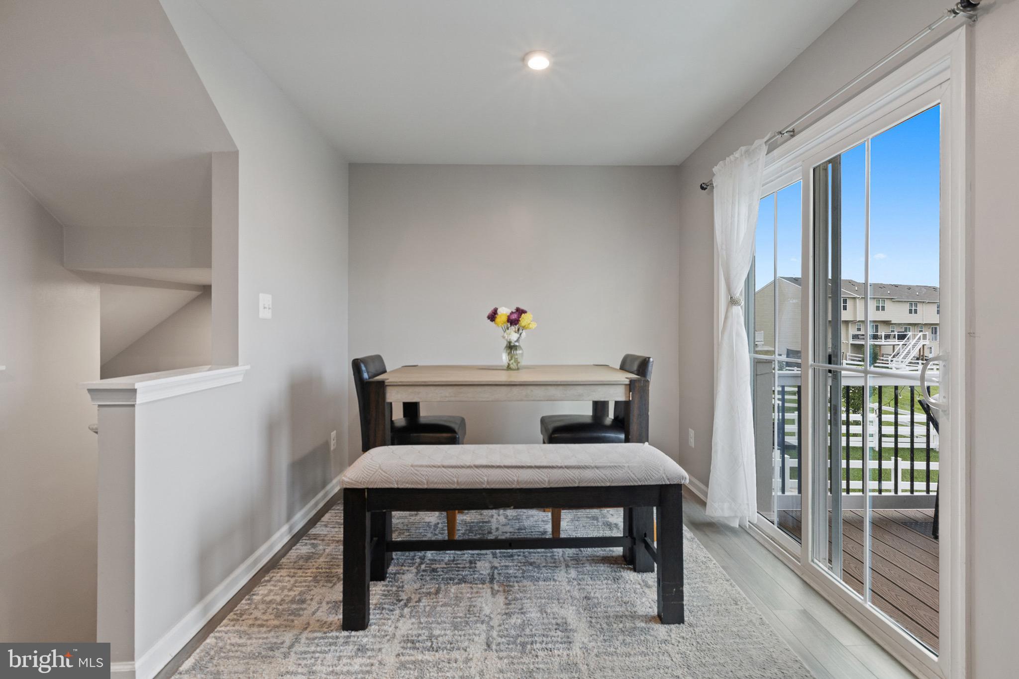 1049 Wickersham Way Middletown, DE 19709 - Photo 17 of 33 a living room with a couch and a table