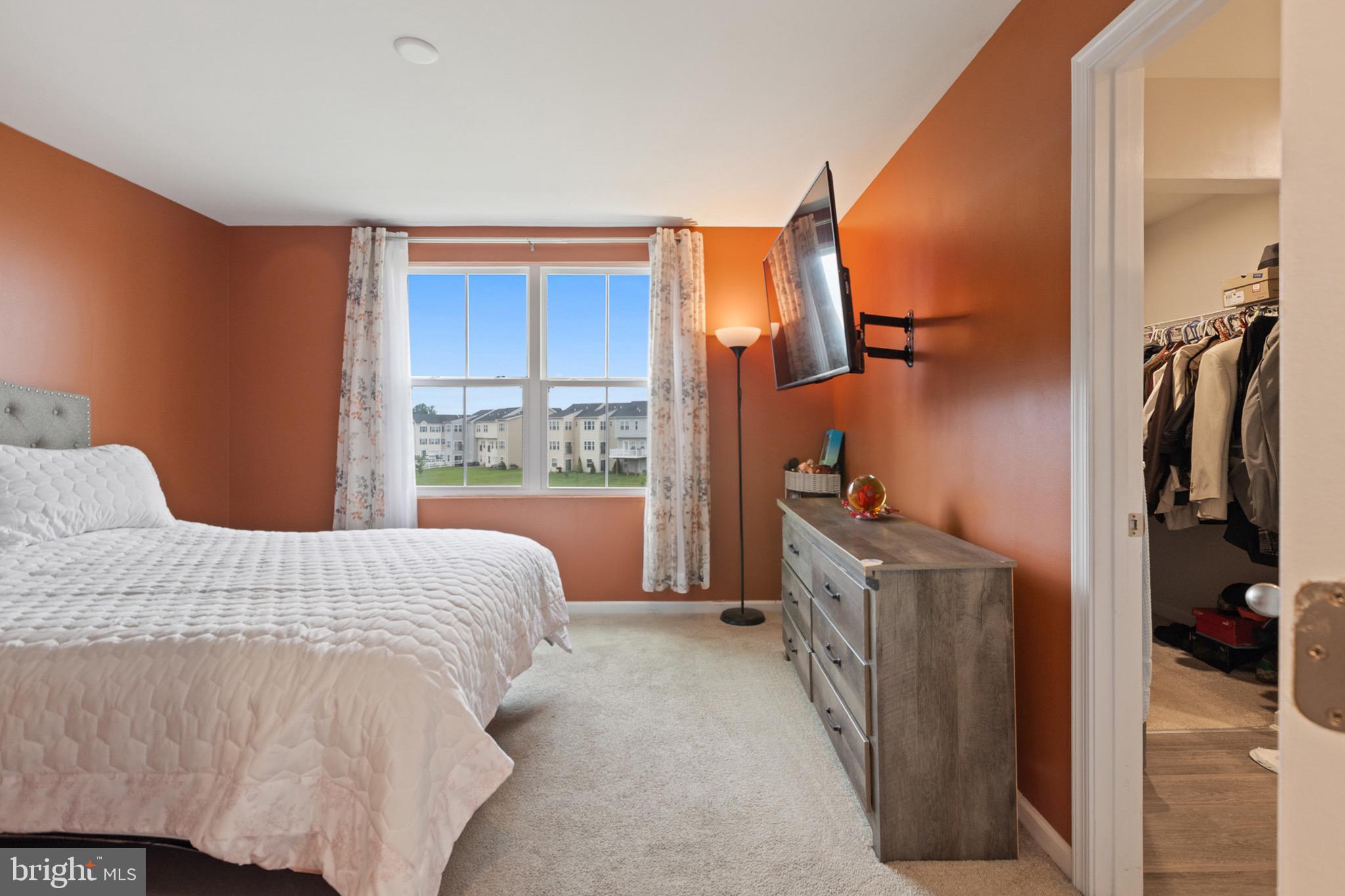 1049 Wickersham Way Middletown, DE 19709 - Photo 19 of 33 a bedroom with a bed and a large window