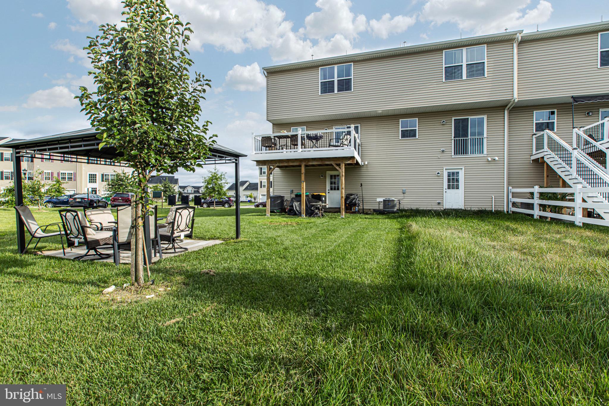 1049 Wickersham Way Middletown, DE 19709 - Photo 28 of 33 a view of an house with backyard space and sitting area