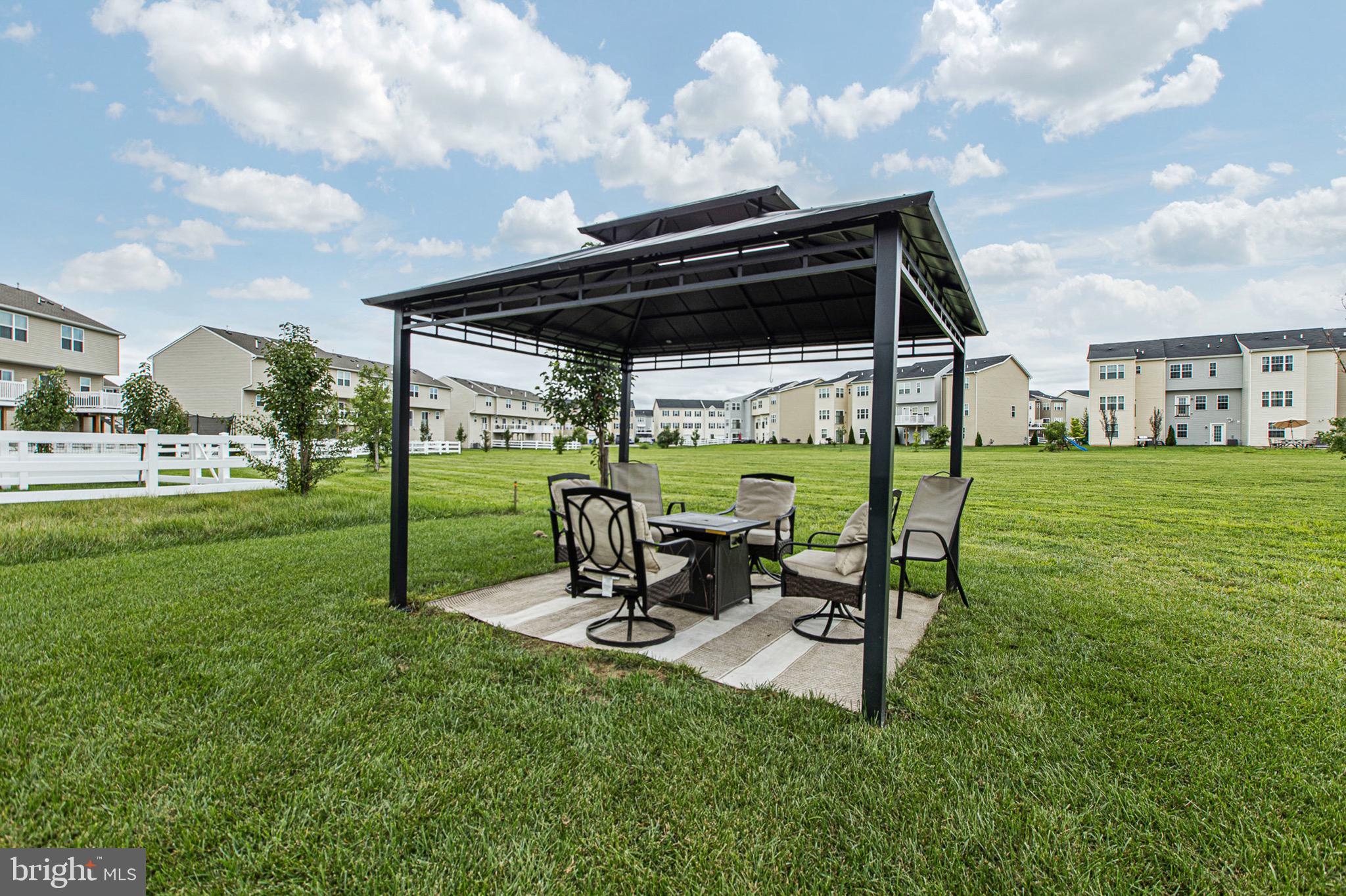 1049 Wickersham Way Middletown, DE 19709 - Photo 29 of 33 a view of a backyard with sitting area