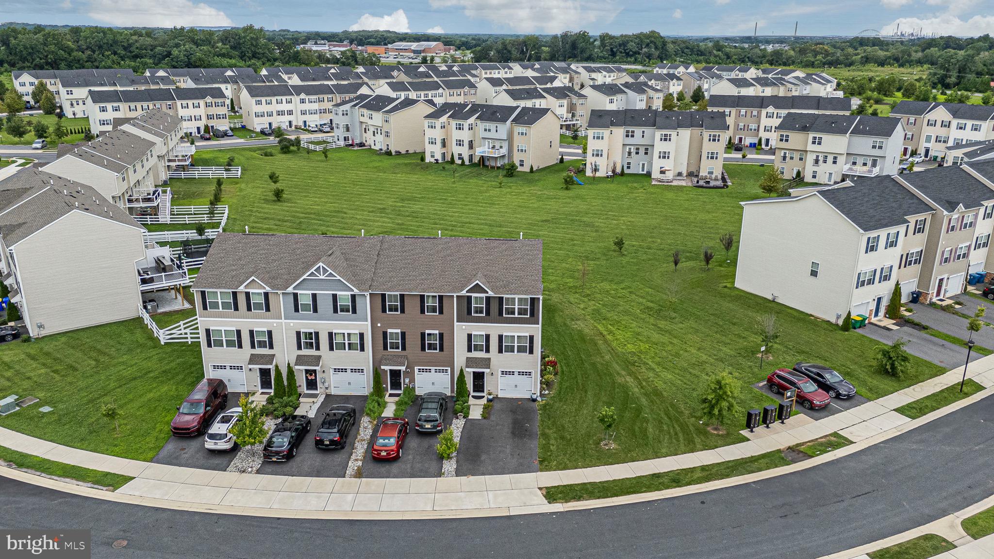 1049 Wickersham Way Middletown, DE 19709 - Photo 32 of 33 a view of a city with tall buildings