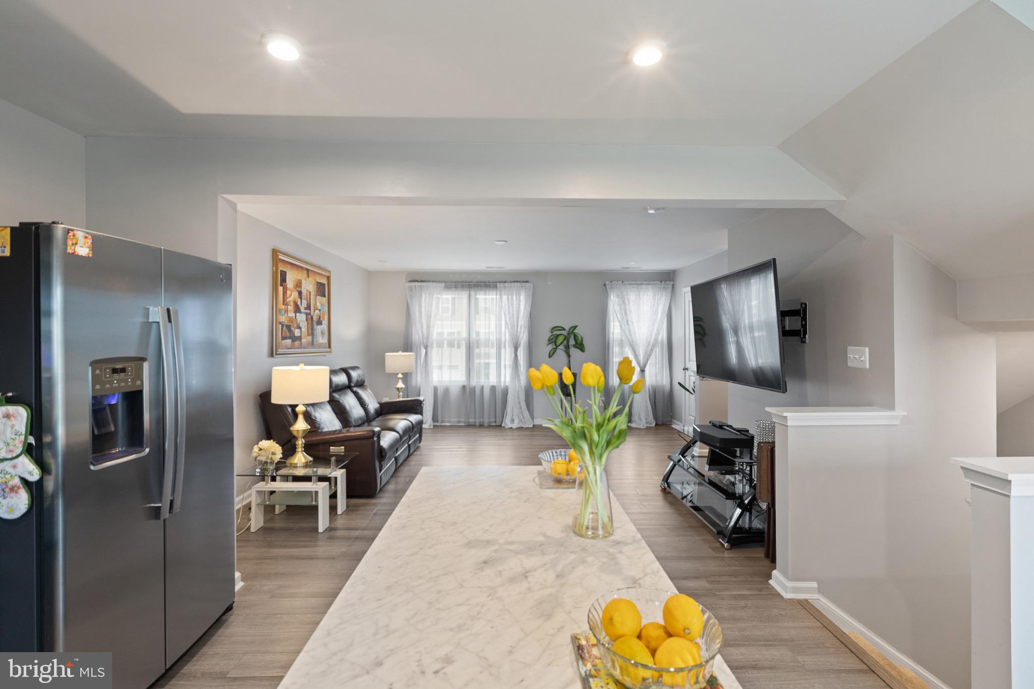 1049 Wickersham Way Middletown, DE 19709 - Photo 8 of 33 a living room with furniture and a flat screen tv