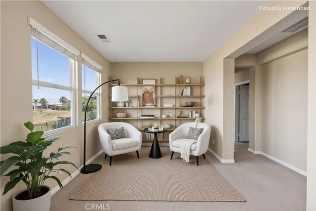a workspace with furniture and window