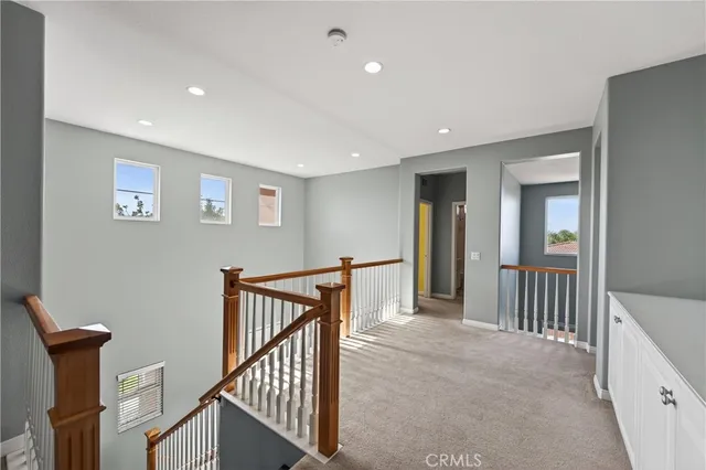 a view of a hallway with workspace