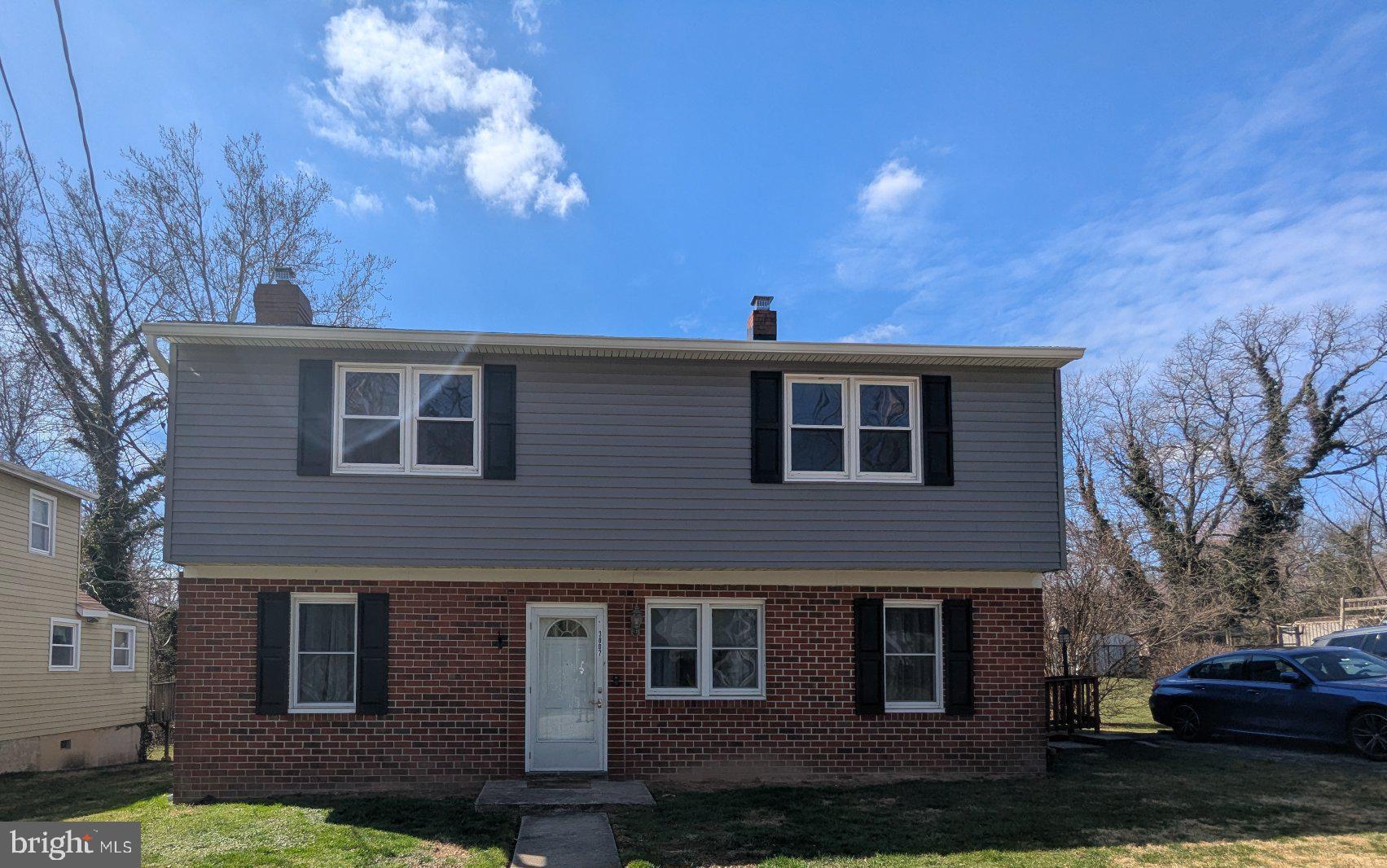 Charming two-story brick home.