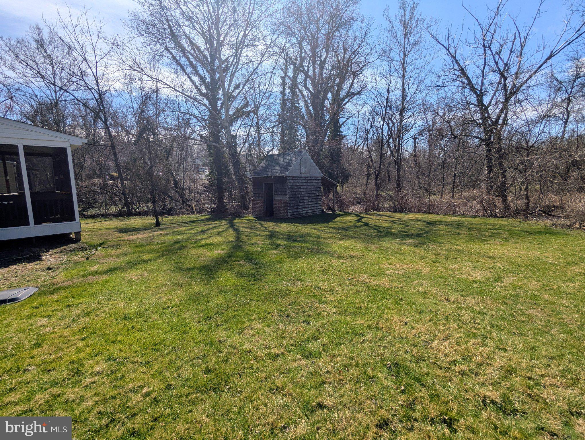 3007 Edwards Avenue Baltimore, MD 21234 - Photo 2 of 3 Spacious yard with rustic relaxation.