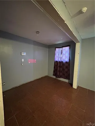 a view of an empty room and window