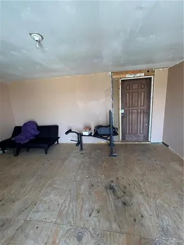 a bedroom with furniture and window