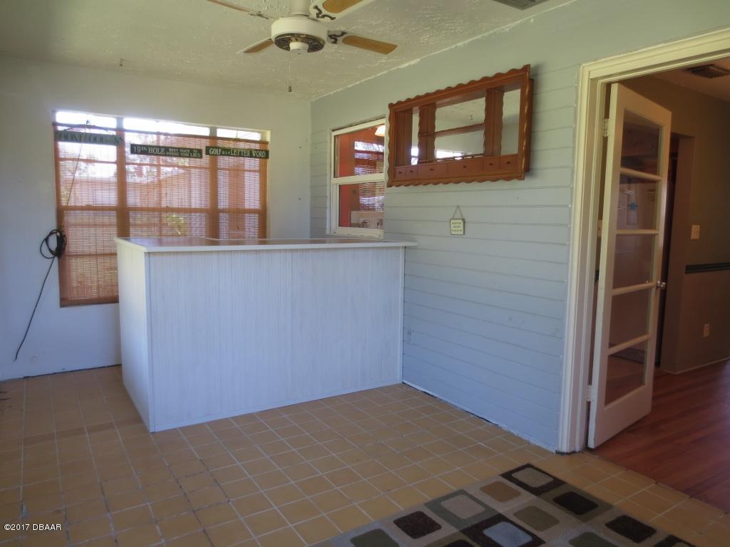 1639 Ridge Avenue Daytona Beach, FL 32117 - Photo 9 of 16 Porch with Bar