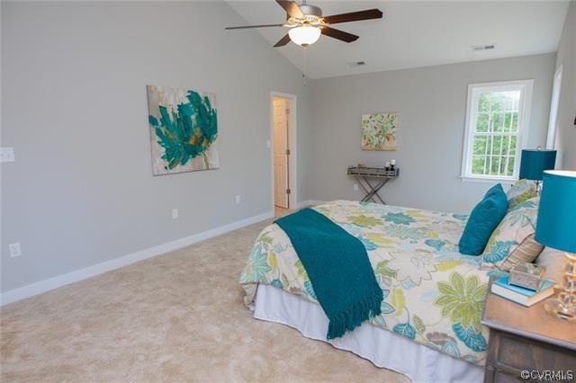 Lot 10 Corte Castle Road Chesterfield, VA 23838 - Photo 16 of 37 a bedroom with a bed and a chandelier