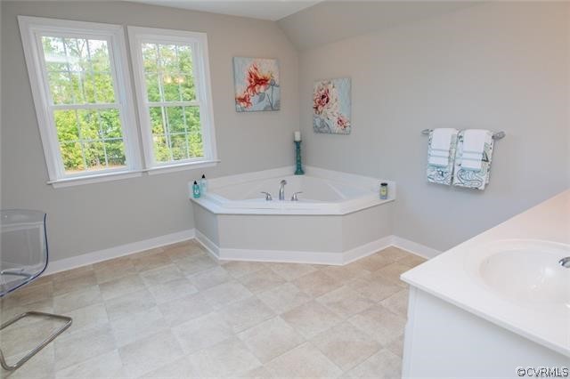 Lot 10 Corte Castle Road Chesterfield, VA 23838 - Photo 21 of 37 a white bath tub sitting in a bathroom