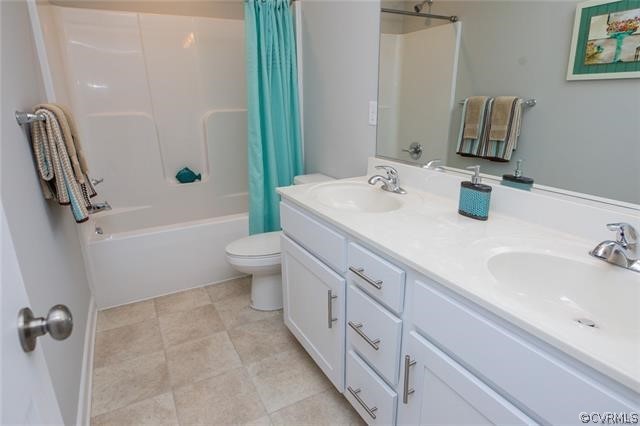 Lot 10 Corte Castle Road Chesterfield, VA 23838 - Photo 25 of 37 a bathroom with a granite countertop sink a toilet and bathtub
