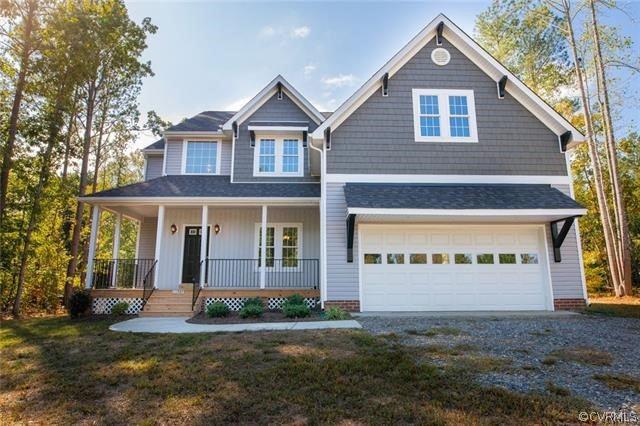 Lot 10 Corte Castle Road Chesterfield, VA 23838 - Photo 36 of 37 a front view of a house with a yard and garage
