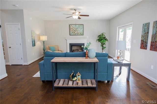 Lot 10 Corte Castle Road Chesterfield, VA 23838 - Photo 5 of 37 a living room with furniture and a fireplace