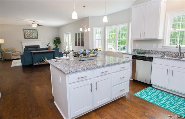 Lot 10 Corte Castle Road Chesterfield, VA 23838 - Photo 10 of 37 a kitchen with granite countertop a stove a sink and a refrigerator