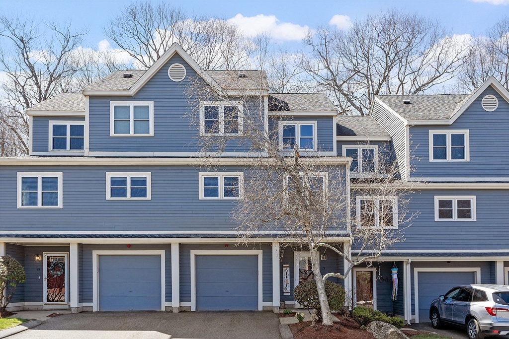 13 Boulderbrook Drive, Unit 13 Peabody, MA 01960 - Photo 2 of 41 a front view of a building with multiple windows