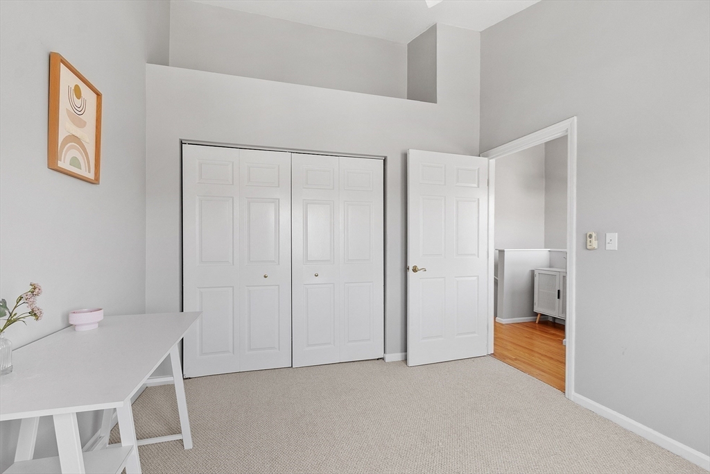 13 Boulderbrook Drive, Unit 13 Peabody, MA 01960 - Photo 25 of 41 a bathroom with a sink and a toilet