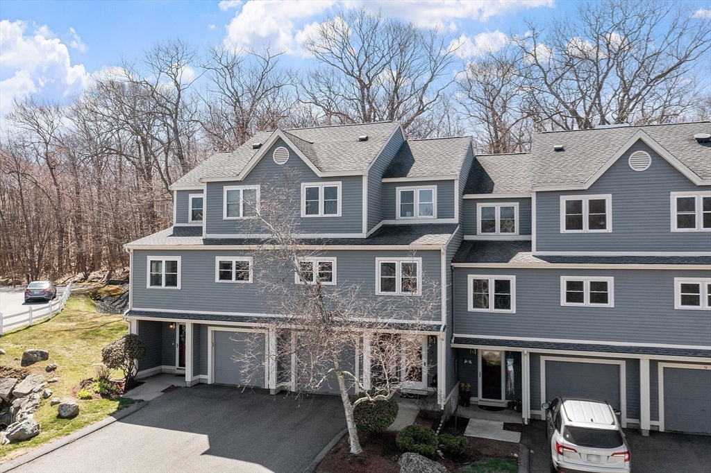 13 Boulderbrook Drive, Unit 13 Peabody, MA 01960 - Photo 30 of 41 a front view of a building with many windows