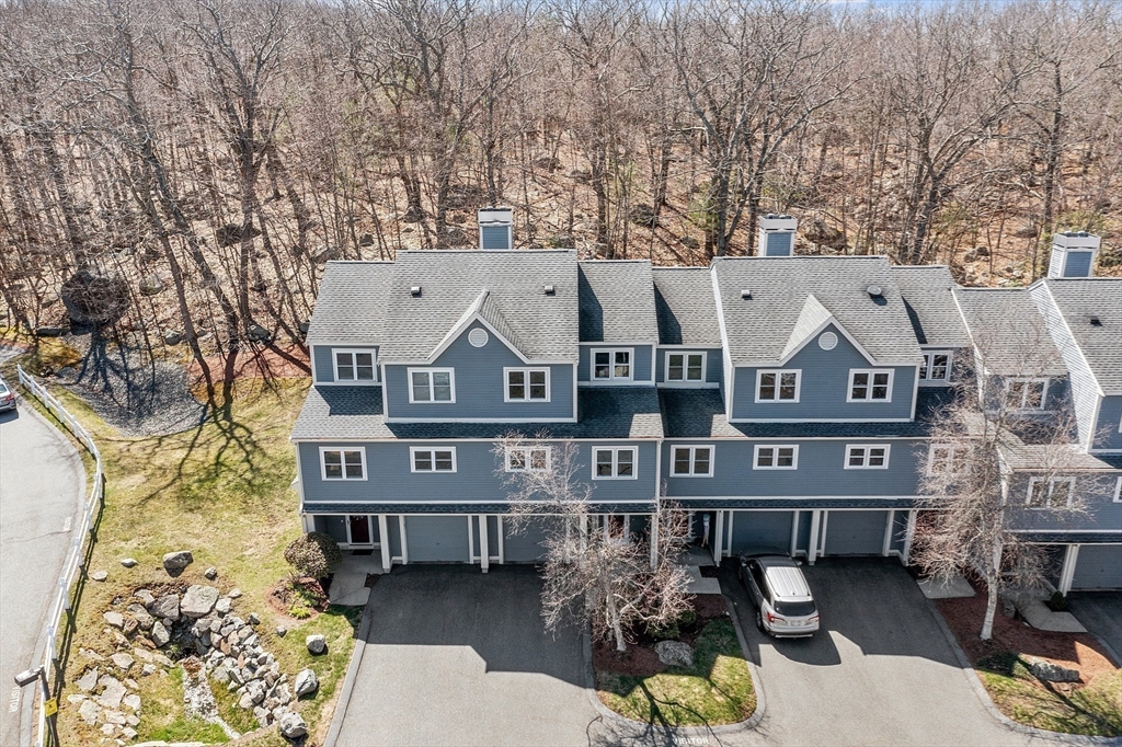 13 Boulderbrook Drive, Unit 13 Peabody, MA 01960 - Photo 34 of 41 an aerial view of a house with a yard