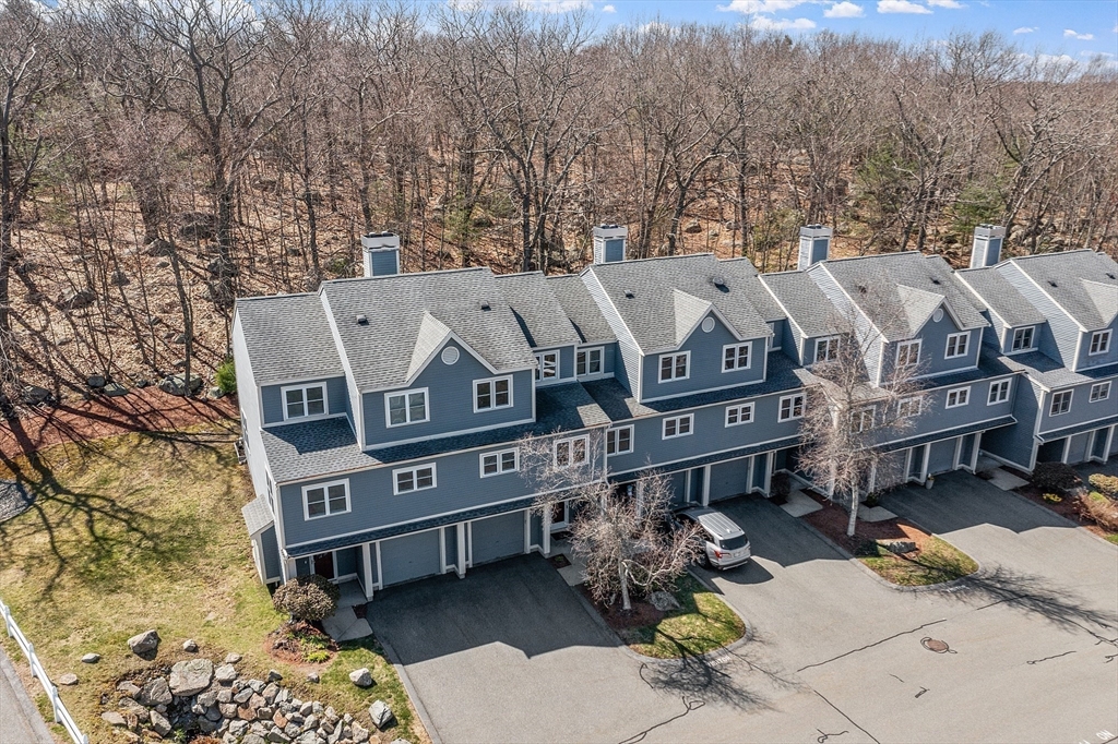 13 Boulderbrook Drive, Unit 13 Peabody, MA 01960 - Photo 36 of 41 a view of a house with a yard