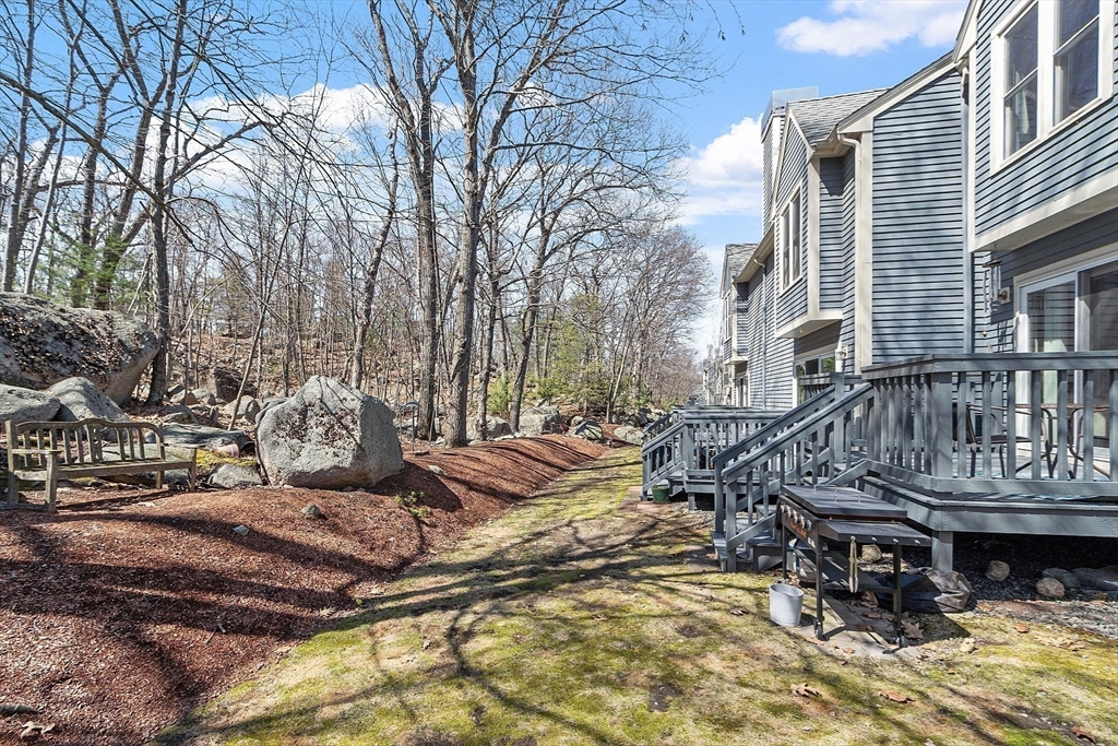 13 Boulderbrook Drive, Unit 13 Peabody, MA 01960 - Photo 38 of 41 a view of a house with backyard and sitting area